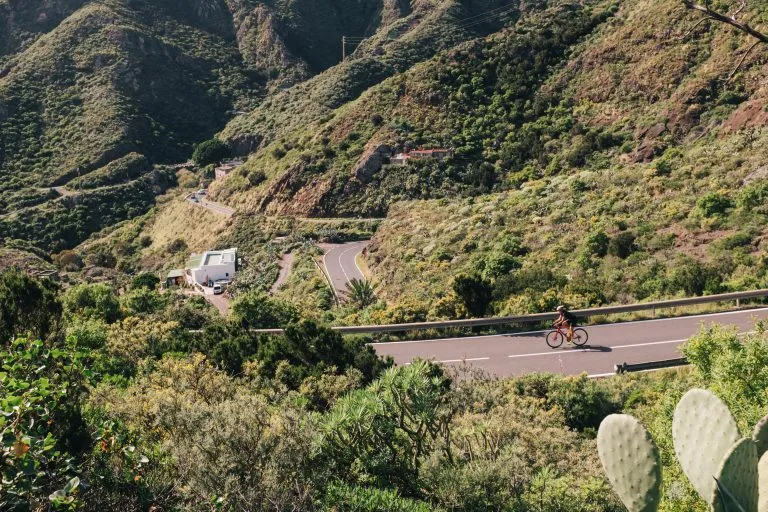 A cyclist on a mountain road
